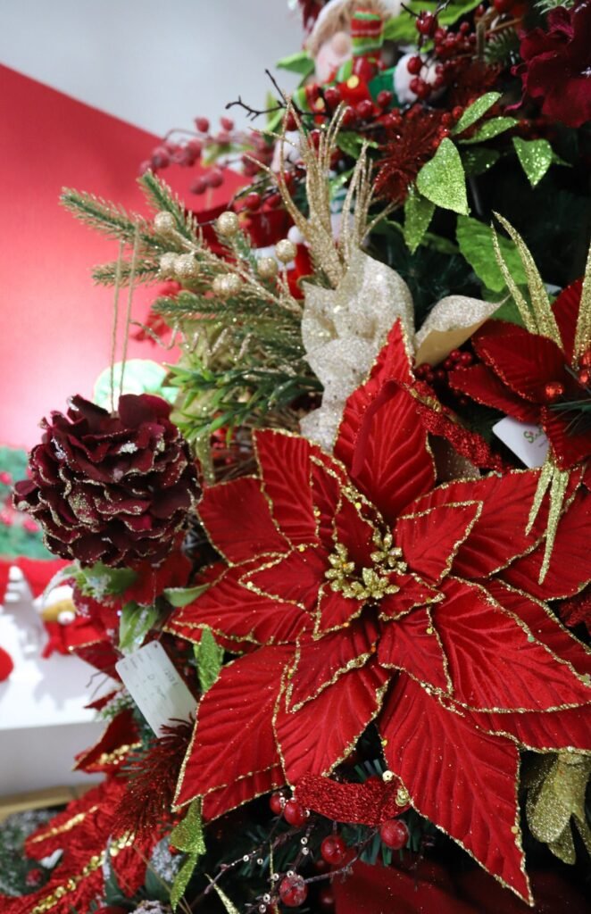 The Art of Pairing Poinsettias and Christmas Trees