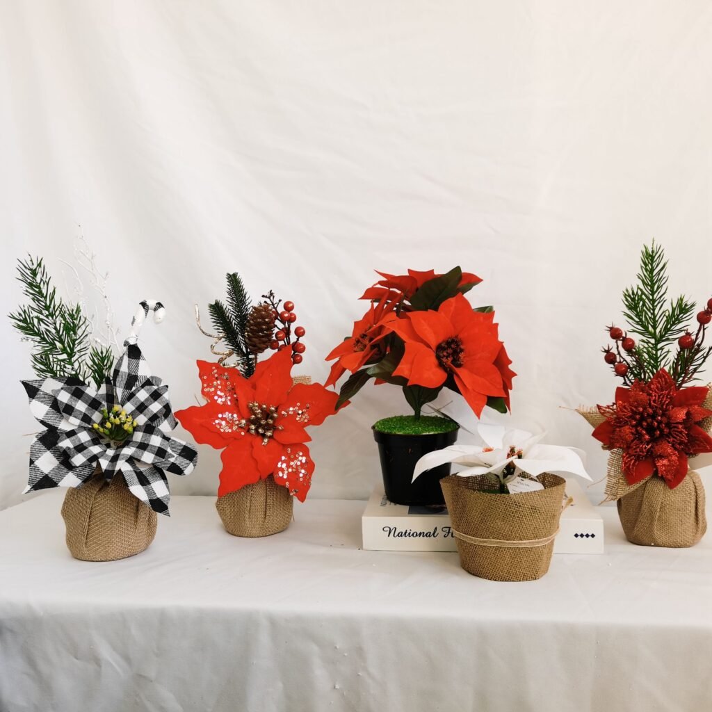  Create a stand-out centerpiece by filling a table with a combination of pine cones, ornaments, and baby poinsettias.