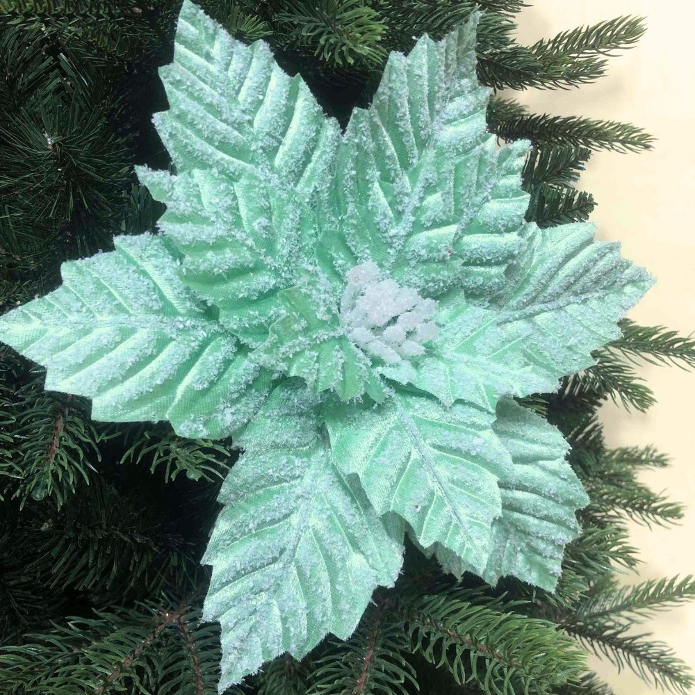 Decorazioni natalizie con stella di Natale verde